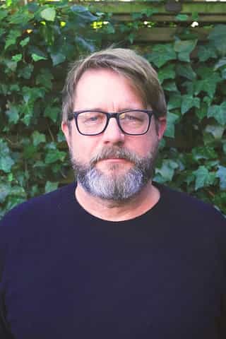 Headshot image of Adam Taylor