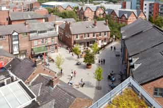 A birds eye after shot of Goose Green once public realm improvements have been completed. There is new paving, trees and planting aswell as being pedestrianised.