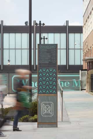 Image showing the signage totems that provide wayfinding throughout the whole NOMA estate.
