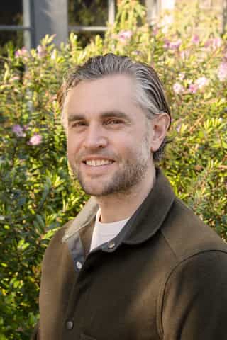 Headshot photo of Nick James