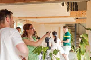 An image of a woman pointing to something